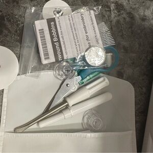 Brother Sewing Accessories Kit with White and Silver Tools